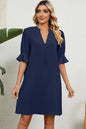 Solid color V-neck loose pleated five quarter sleeve dress for women